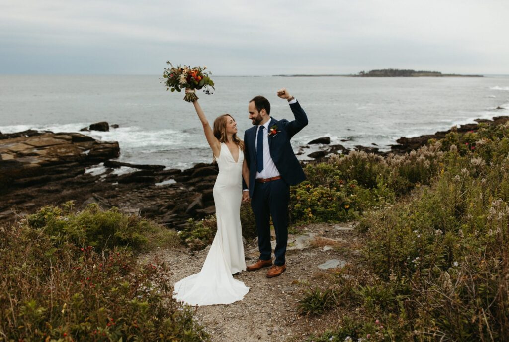 a couple celebrates their marriage at their Two Lights State park elopement
